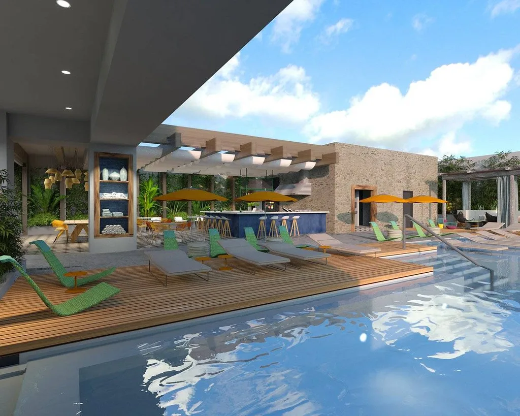 large resort pool surrounded by green lounge chairs