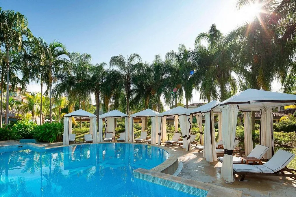 6 cabanas around tropical resort pool