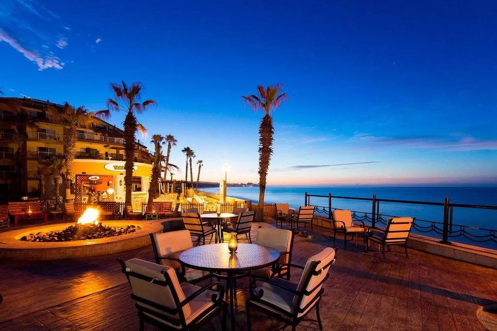 resort restaurant patio on ocean at dusk