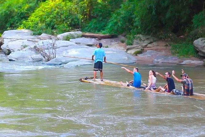people on raft on water