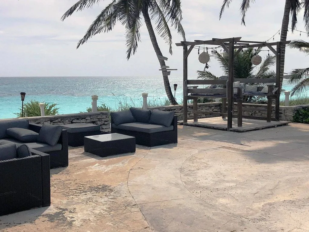 lounge funiture in front of beach