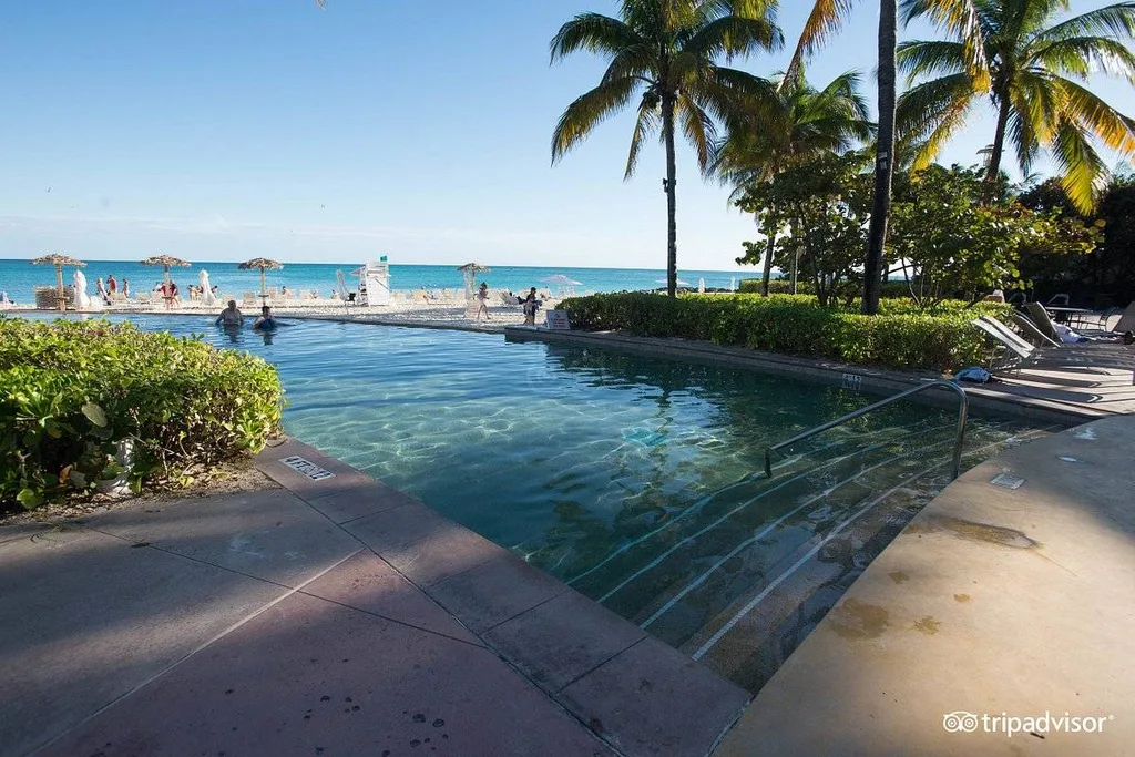pool with steps in front of beach