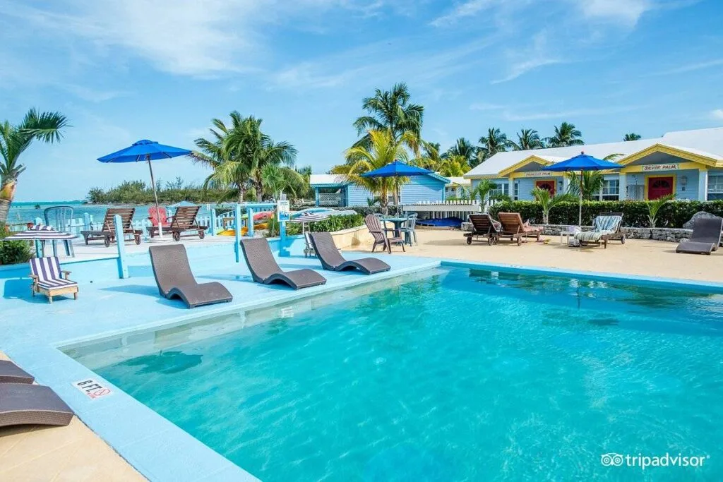 square resort pool surrounded by lounge chairs
