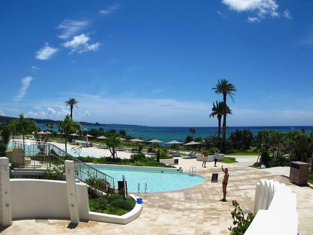 resort pool in front of ocean
