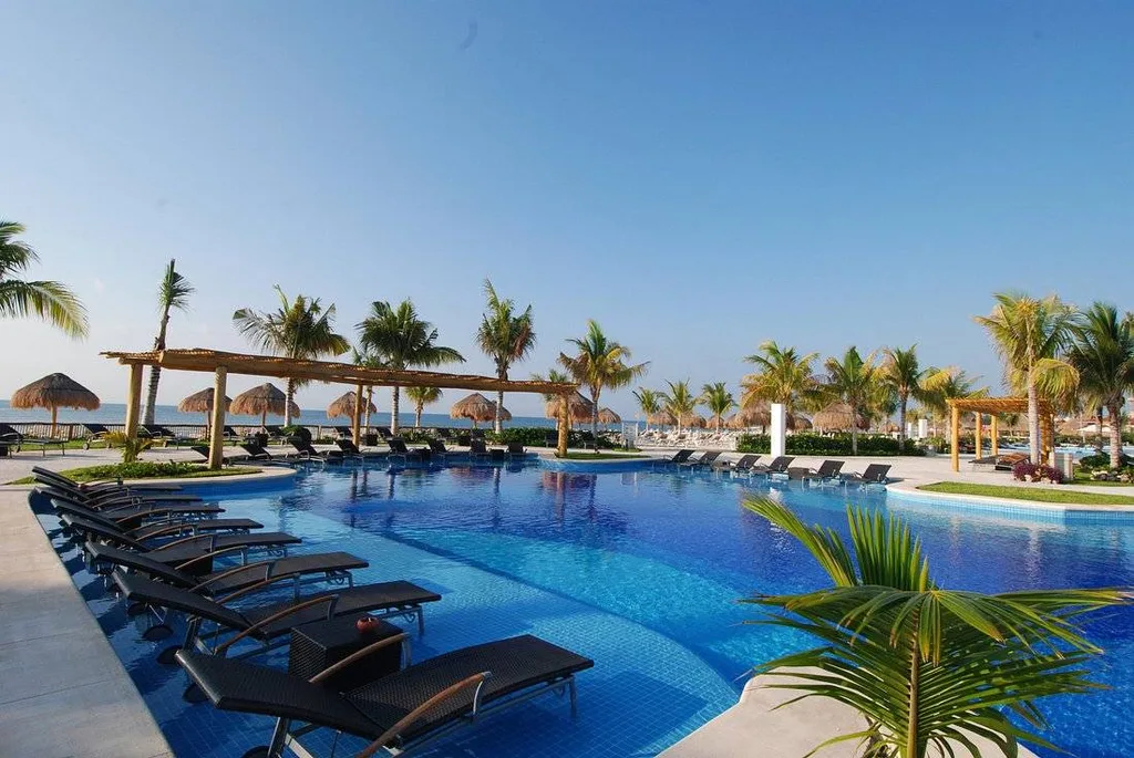 tropical resort pool with palm trees