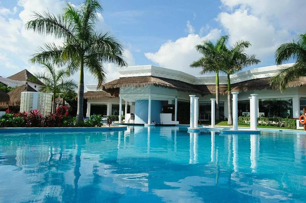 resort pool with palm trees