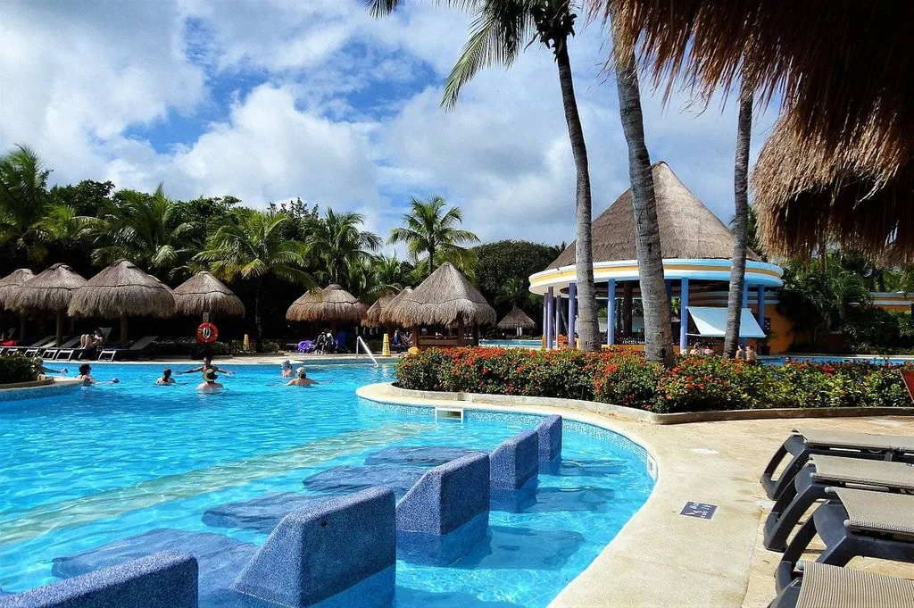 resort pool with palm trees