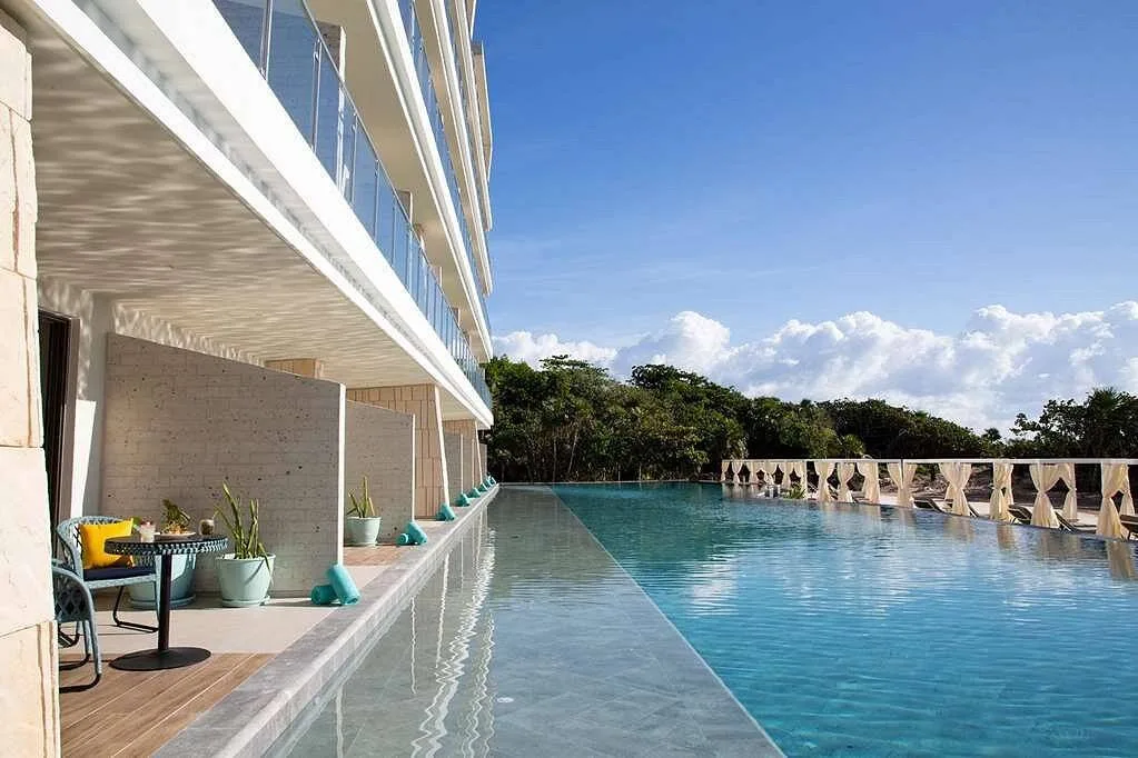 resort units with a pool in front