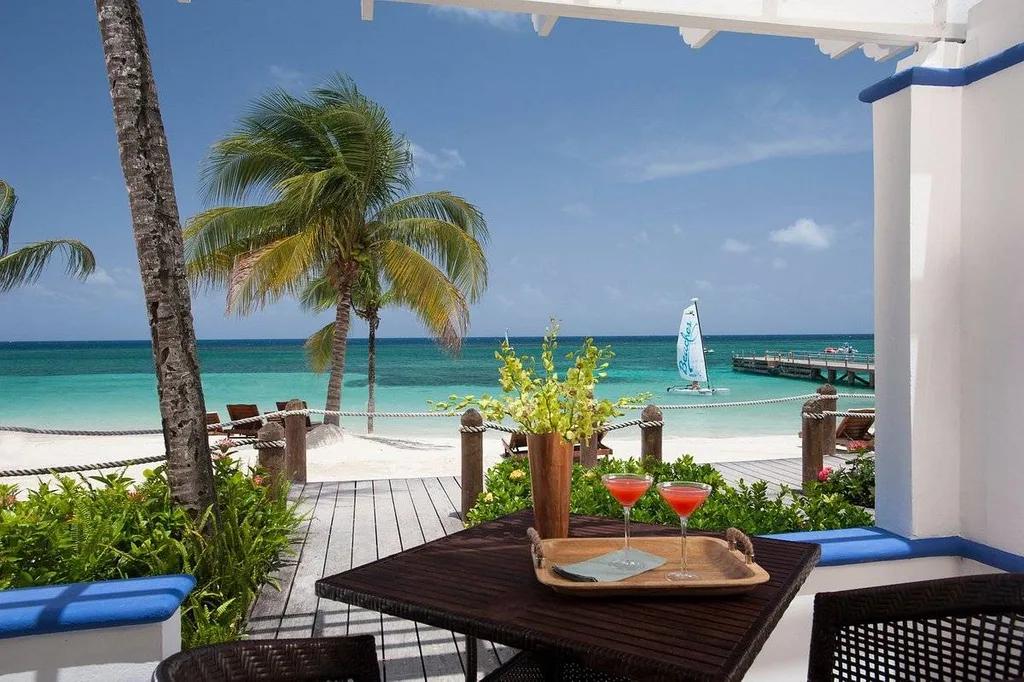 red drinks on table at the beach