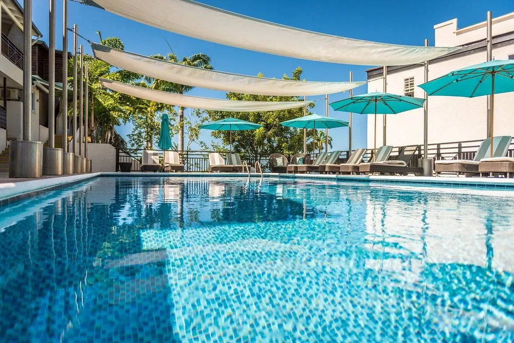 large resort pool with sun covers
