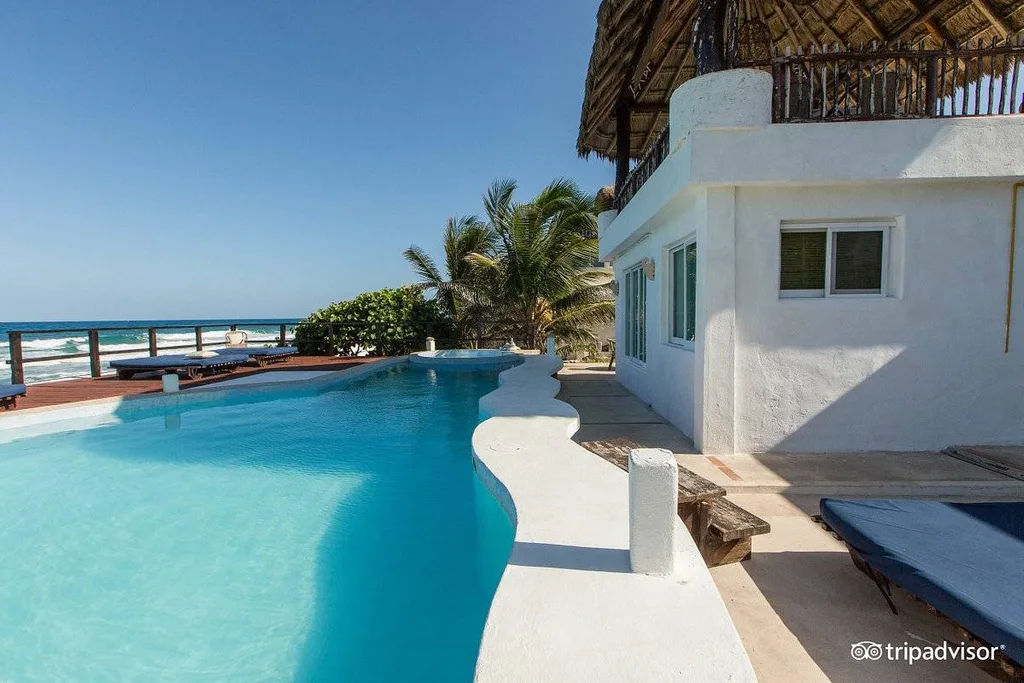 long pool along white sand beach