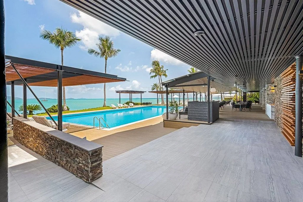 long pool with palm trees