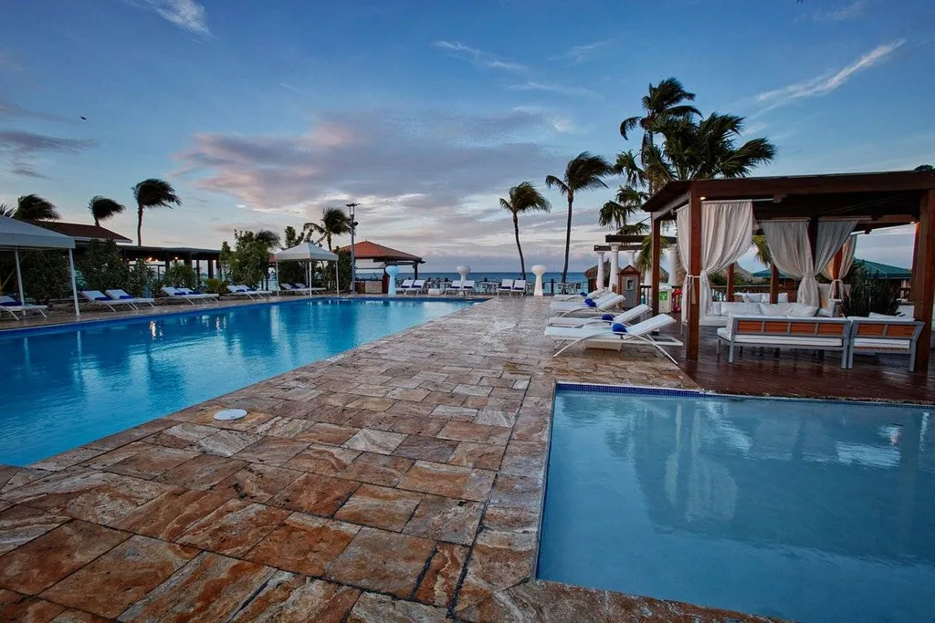 two large pools separated by walkway