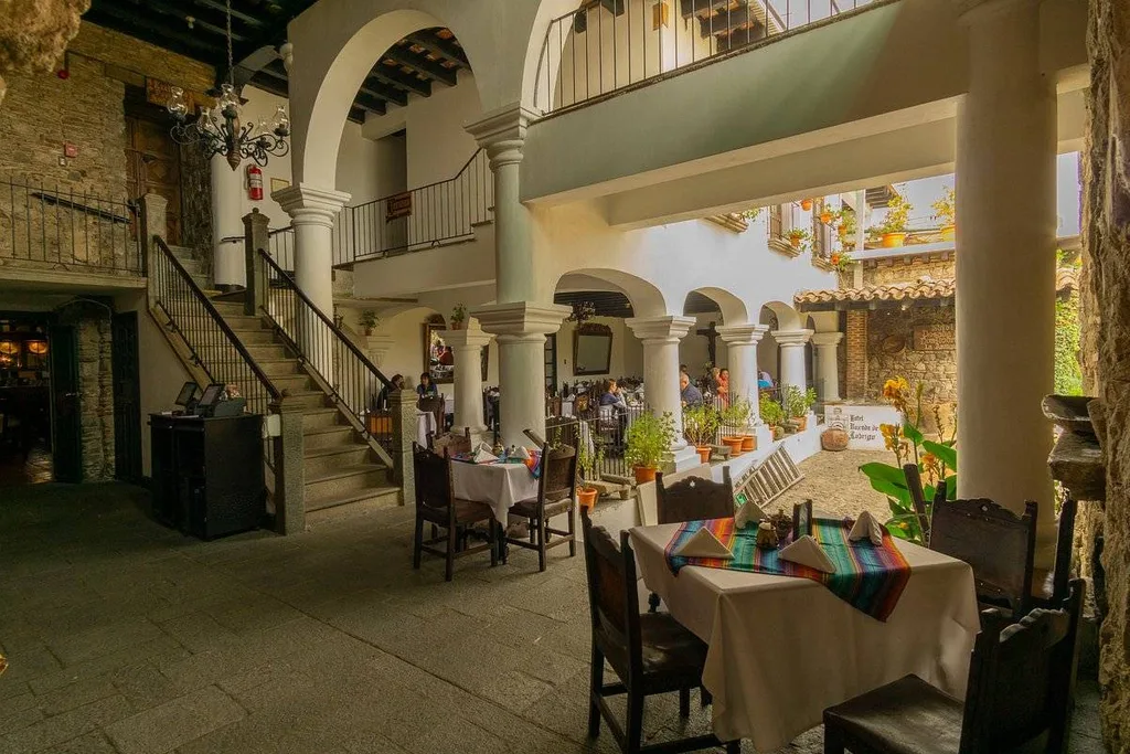 restaurant with set tables and second floor