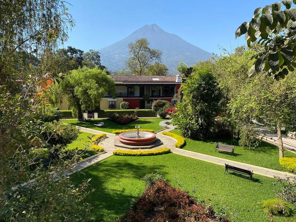 courtyard with fountain with mountain in background