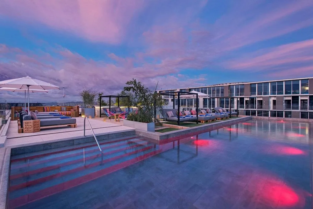 lounge chairs and umbrellas on rooftop