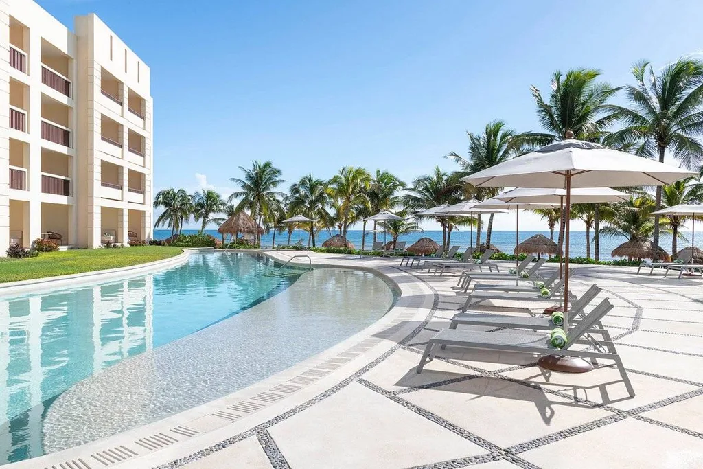 resort pool in next to ocean