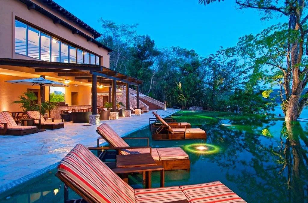 lounge chairs sitting in water