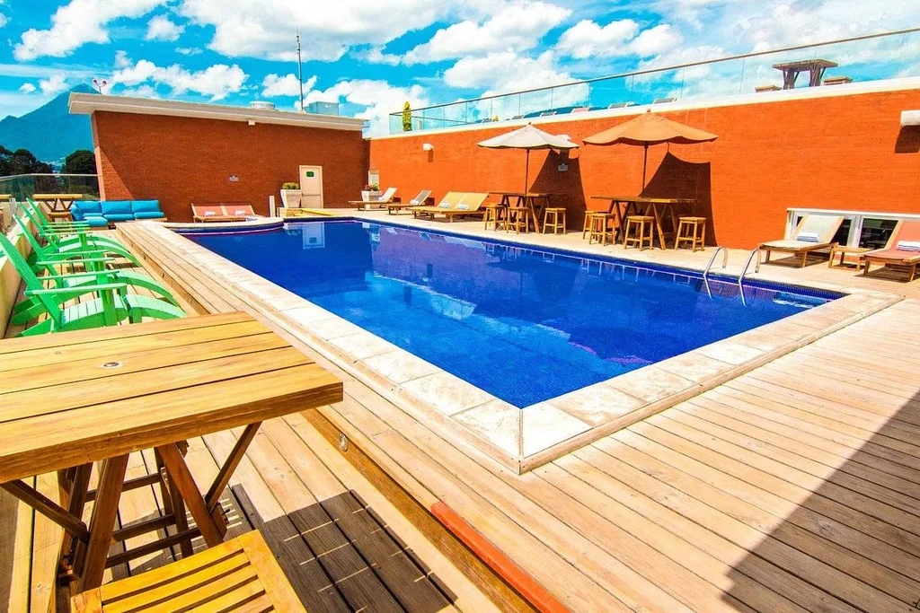 swimming pool in deck with orange walls