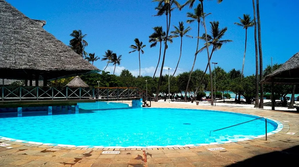 resort pool with palm trees