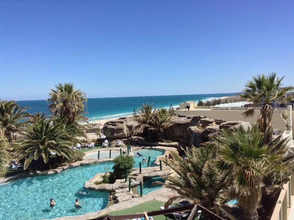 aerial view of resort pool at the beach