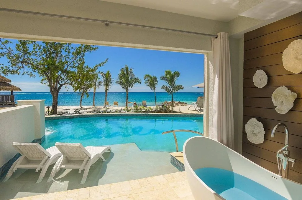 private resort room with pool outside window