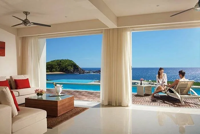 couple in resort room with private pool