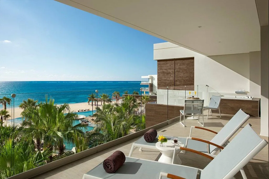 resort patio with chairs overlooking ocean