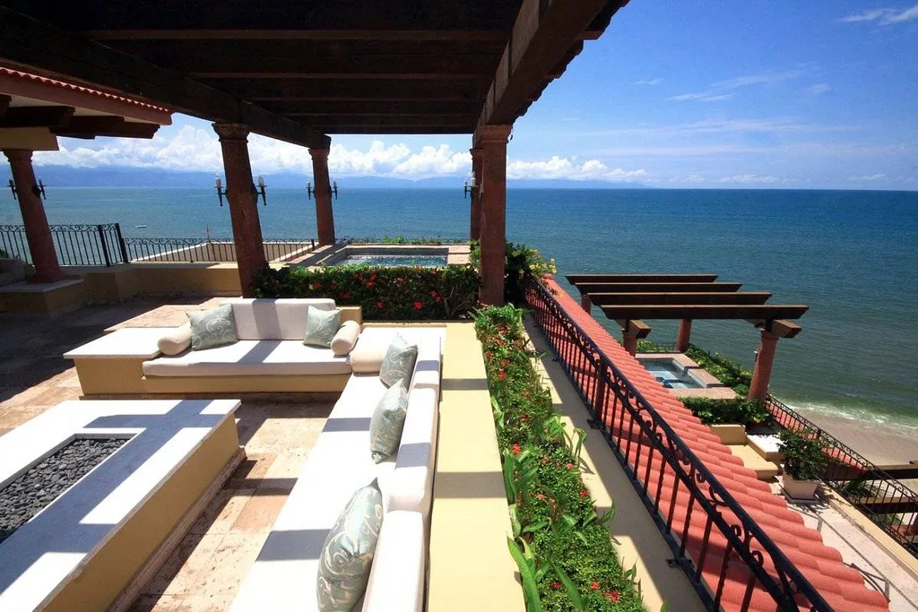 covered patio at beach with lawn furniture