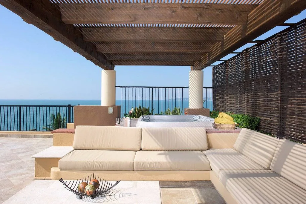 covered patio with lounge furniture