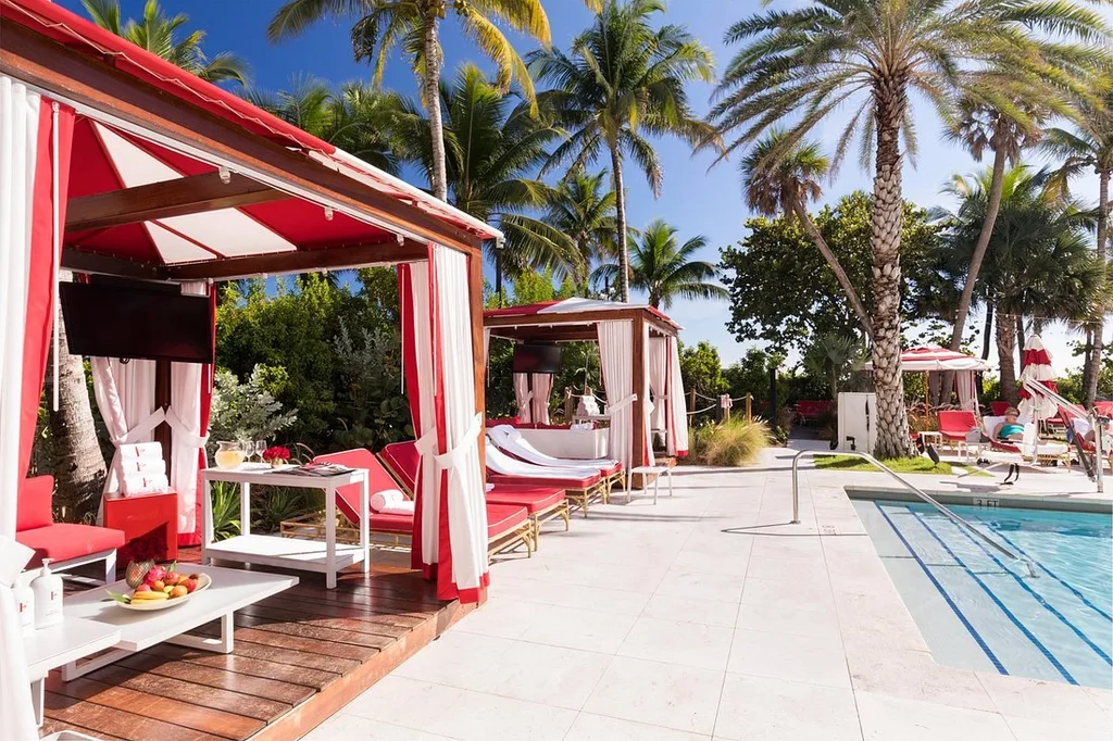 Faena Hotel Miami Beach red cabanas next to pool