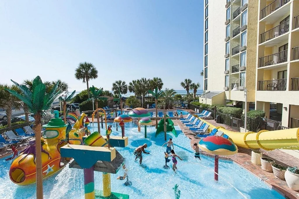 Sea Crest Oceanfront Resort with children playing in kids pool area