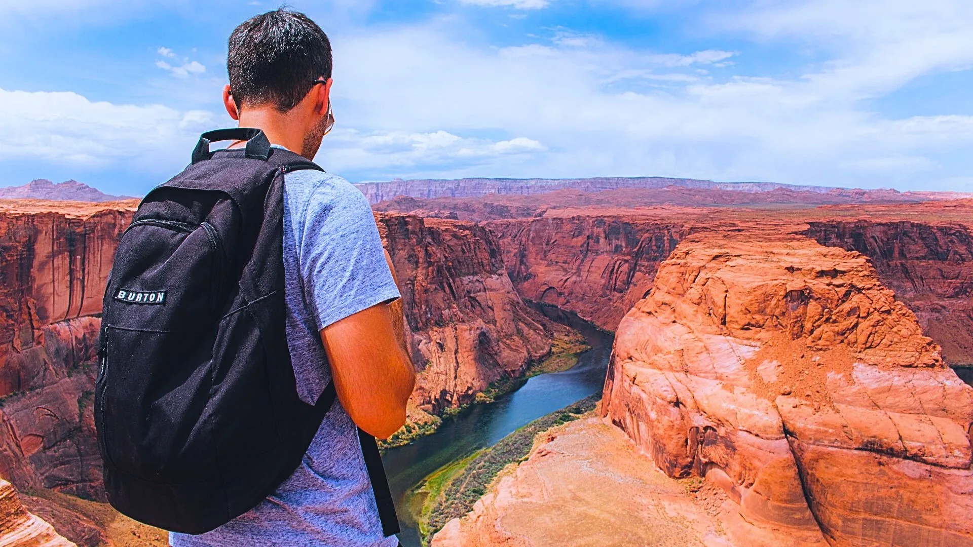 backpacker looking over grand canyon