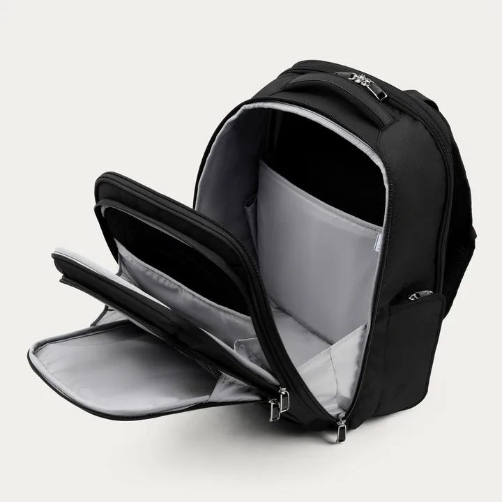 An aerial view of waves crashing against a shore.