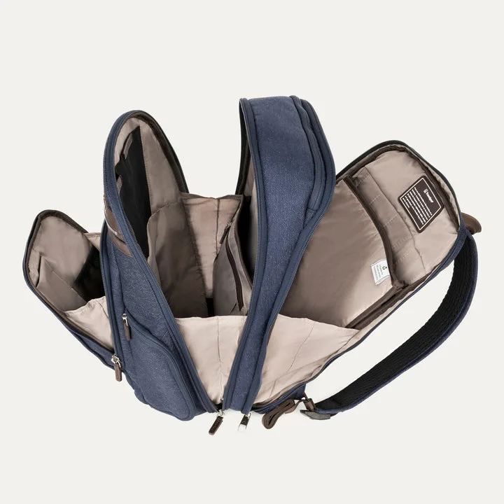 An aerial view of waves crashing against a shore.