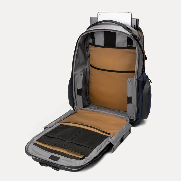 An aerial view of a field. A road runs through the upper right corner.