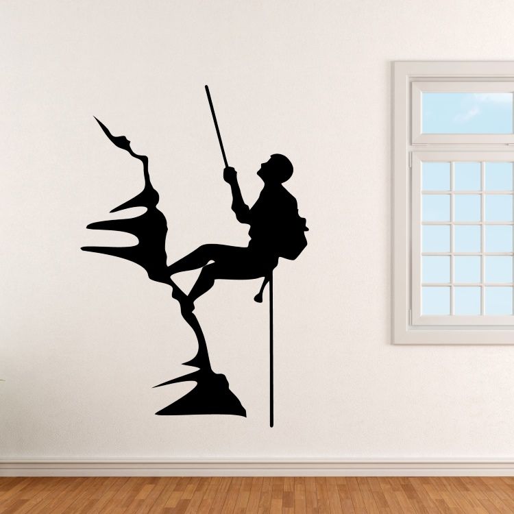 Horolezec na skále - vinylová samolepka na zeď