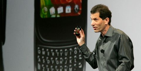 Image: Rubinstein, chairman and CEO of Palm, holds a new Palm phone during a news conference at the CES in Las Vegas