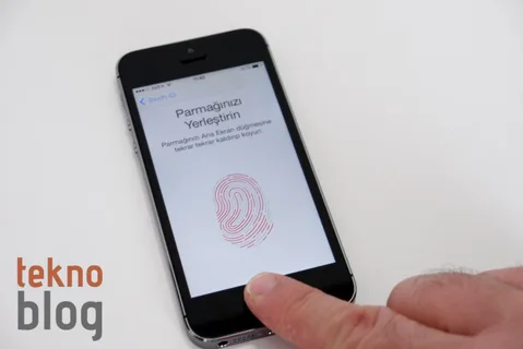 Apple Touch ID parmak izi sensörünü ekrana yerleştirmekle ilgileniyor