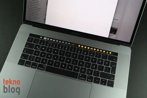 Apple’ın kelebek tasarımlı klavyesiyle ilgili olarak yurt dışında açılmış dava uzlaşmayla son buldu