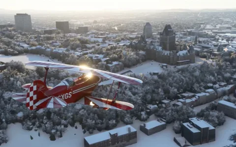 Yeni Microsoft Flight Simulator videosu karlı dağları ve şehirleri gösteriyor